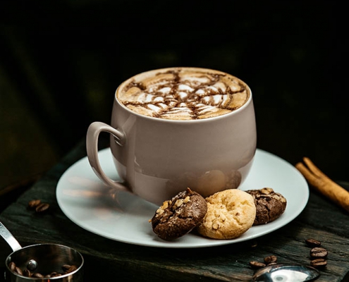 hot chocolate served with cookies