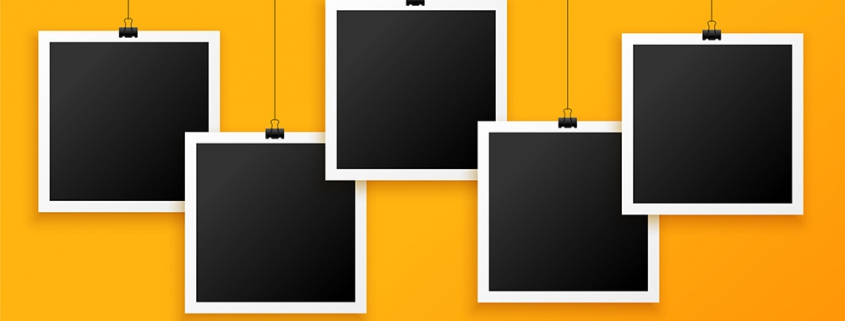 five hanging photo frames on yellow background